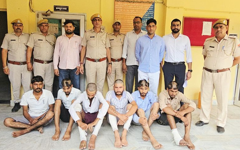 The accused in police custody.